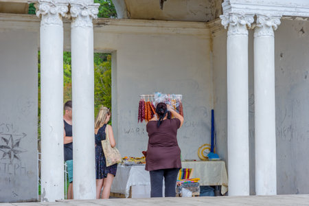 Batumi, Georgia - August 27, 2017: Lady selling churchkhela and other georgian delights at the train station.のeditorial素材