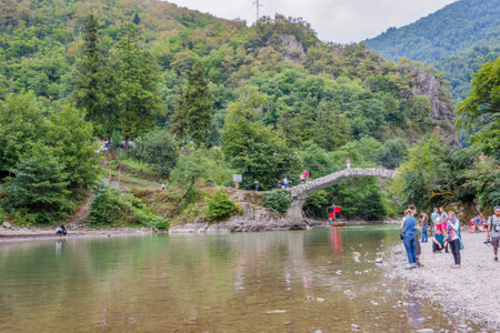 Makhuntseti, Georgia - August 26, 2017: People walking and taking photos on Makhuntseti bridge, a known tourist place in Adjara regionのeditorial素材