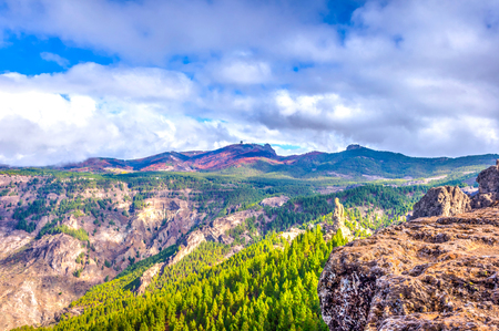 Pico de las Nieves peak over rocky landscape and pine forest, Gran Canaria, Spainの写真素材