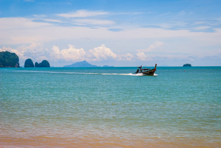 Typical thai boats on the beach in Krabi, Thailandのeditorial素材