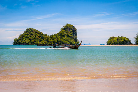 Typical thai boats on the beach in Krabi, Thailandのeditorial素材