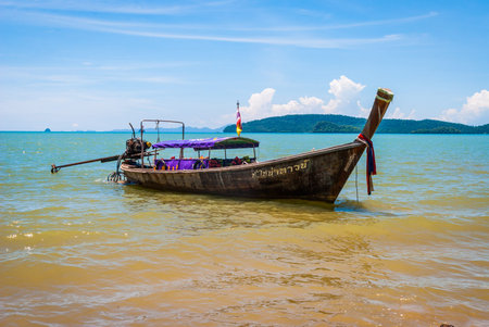 Typical thai boat on the beach in Krabi, Thailandのeditorial素材
