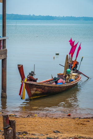 Fishing boat by the village on pillars, Koh Lanta, Thailandのeditorial素材