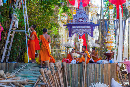 Chiang Mai, Thailand - Nov 2015: Buddhist monk preparing space in the temple for the celebration of...