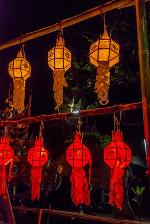 Lit up lanterns at night at the temple, Chiang Maiの写真素材