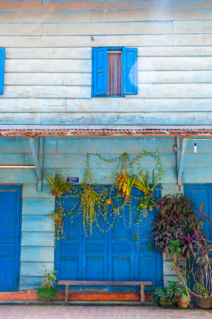 Blue building with shutters, French colonial style, Luang Prabang, Laosのeditorial素材