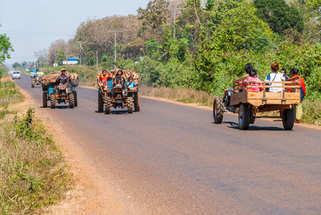 Paksong, Laos - Feb 2016: Transport by tractor Laosのeditorial素材