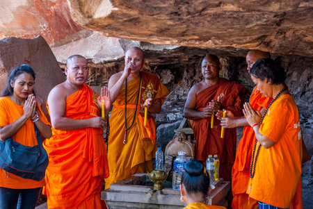 Muang Champassak, Laos - Feb 2016: Group of buddhist prayers at Wat Phou temple, Laosのeditorial素材