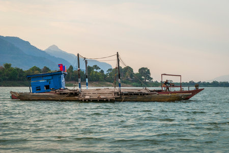 Muang Champassak, Laos - Feb 2016: Ferry over Mekong river, Laosのeditorial素材