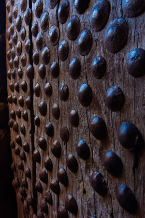 Old wooden door on underground church in Lalibela, Ethiopia