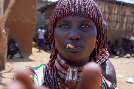 Turmi, Ethiopia - Nov 2018: Portrait of Hamer tribe woman - first wife with necklace. Omo valley のeditorial素材
