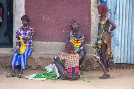 Turmi, Ethiopia - Nov 2018: Local market of Hamer tribe in Turmi selling various food and people gathering. Omo valley のeditorial素材