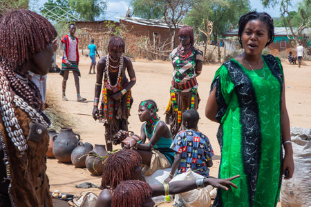 Turmi, Ethiopia - Nov 2018: Local market of Hamer tribe in Turmi selling various food. Omo valley のeditorial素材