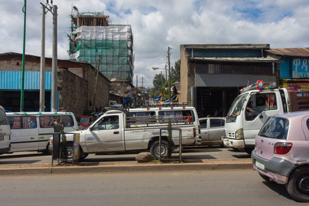 Addis Ababa, Ethiopia - Nov 2018: Traffic around mercato - large open air market considered to be the biggest market in Africa to sell and buy goodsのeditorial素材