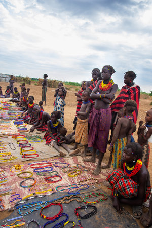 Omorate, Ethiopia - Nov 2018: Dasanech tribe tourist market in the village. Omo valleyのeditorial素材