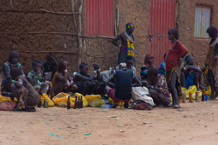 Turmi, Ethiopia - Nov 2018: Local market of Hamer tribe in Turmi selling various food and people...