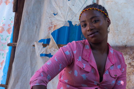 Turmi, Ethiopia - Nov 2018: Young ethiopian lady posing at the market. Omo valleyのeditorial素材
