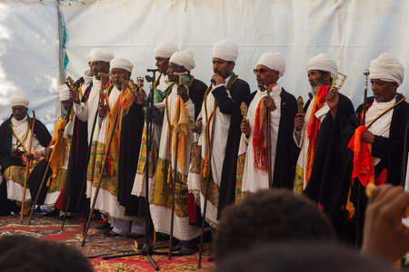 Lalibela, Ethiopia - Nov 2018: Older man singing ceremony at pilgrimage at Lalibela underground churchesのeditorial素材