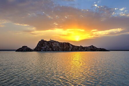 Danakil desert depression with salt flats and rocks in sunset, Ethiopiaの写真素材
