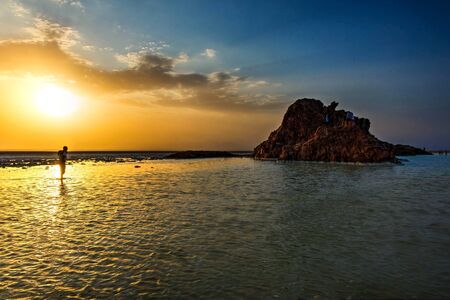 Danakil depression with salt lake and rock in sunset, Dallol desert, Ethiopiaの写真素材