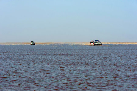 Dallol, Ethiopia - Nov 2018: Driving by 4x4 at Danakil depression salt lake, safari.のeditorial素材