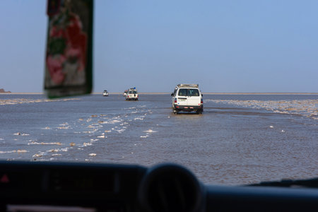 Dallol, Ethiopia - Nov 2018: Driving by 4x4 at Danakil depression salt lake, safari.のeditorial素材
