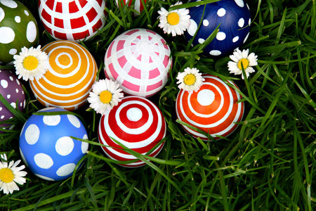 Hand-painted Easter eggs, hidden in the grass 
