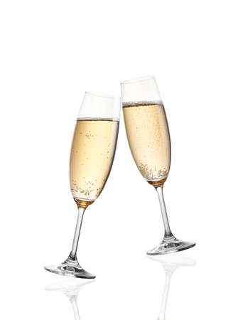 Glass of champagne isolated on white backgroundの写真素材