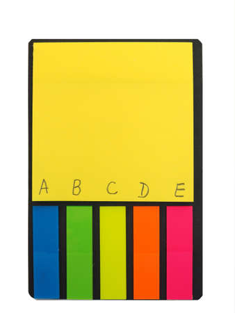Block of multicolored paper stikers. Accessory for office.の写真素材