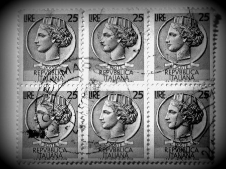 Italian lady  face postage stamp, circa 1953の写真素材