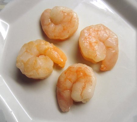fresh shrimps in a porcelain plateの写真素材