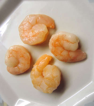 fresh shrimps in a porcelain plateの写真素材