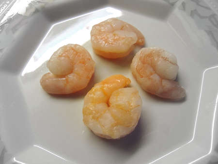 fresh shrimps in a porcelain plateの写真素材