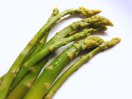 boiled asparagus in porcelain plateの写真素材