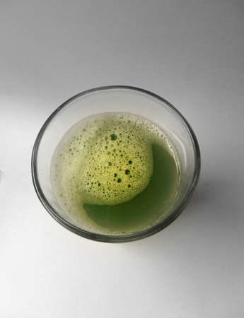 green detox celery juice closeup photoの写真素材