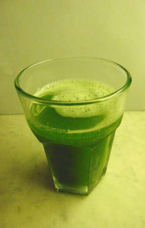 green detox celery juice closeup photoの写真素材