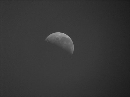 photo of the moon during the night