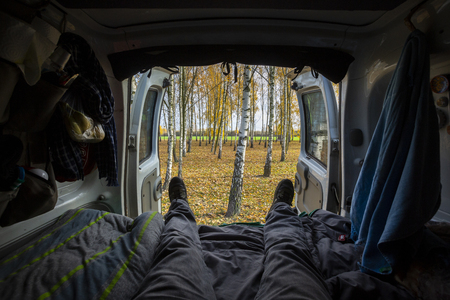 Van life backdoor view during a road trip in Poland.の写真素材
