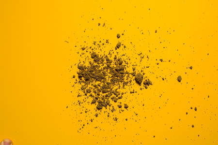 Texture clay moving in yellow backgroundの写真素材