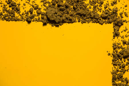 Texture clay moving in yellow backgroundの写真素材