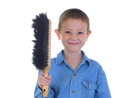 Boy with a broomの写真素材