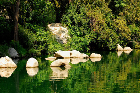 Large rocks at edge of lake