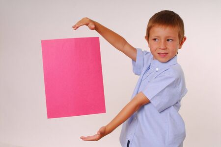 Boy holding Blank Signの写真素材