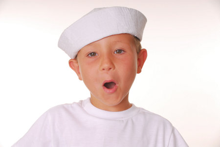 Young boy in a sailor's capの写真素材