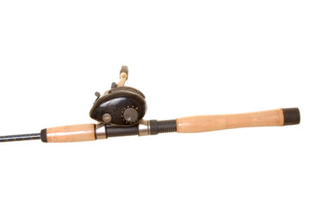 Isolated close-up of a fishing rod and reelの写真素材