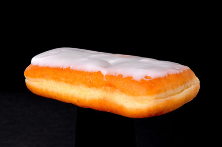 Old fashioned type donut isolated on black