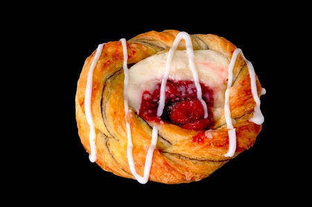Cherry and cream cheese danish pastry isolate on blackの写真素材