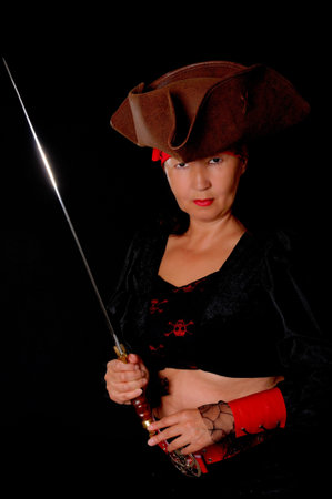 A lovely pirate girl with a cutlassの写真素材