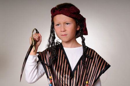 Young boy wearing a pirate's costumeの写真素材