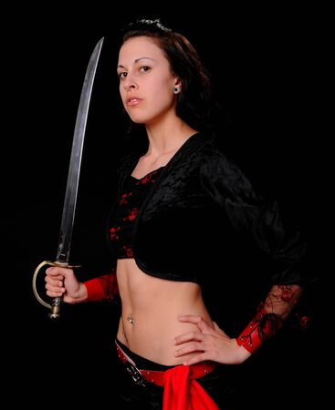 A lovely pirate girl with a swordの写真素材